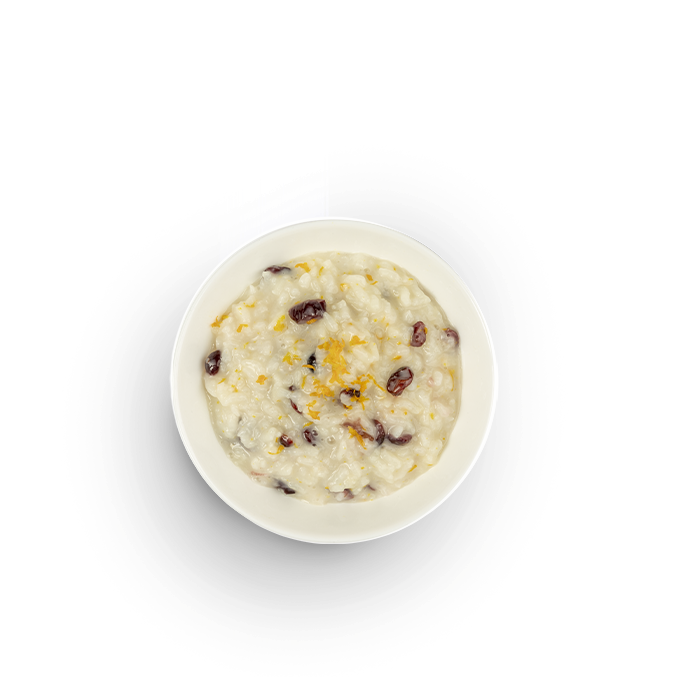 Каша рисовая с клюквой и апельсиновой цедрой на кокосовом молоке